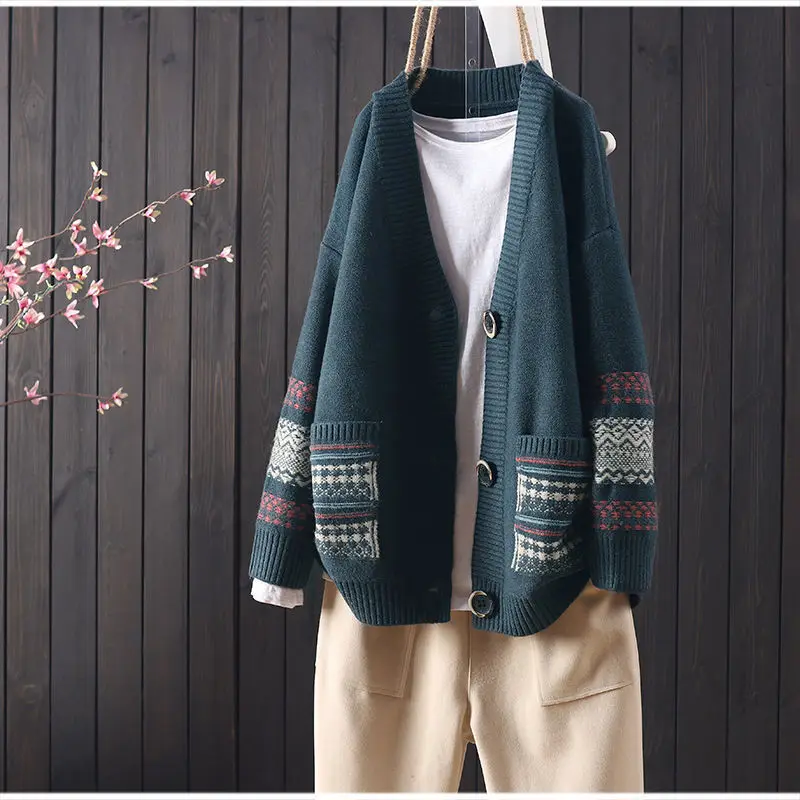 Megztinis rudenį ir žiemą prarasti laukinių mezgimo modelio retro literatūros V-kaklo, ilgomis rankovėmis megzti megztinis