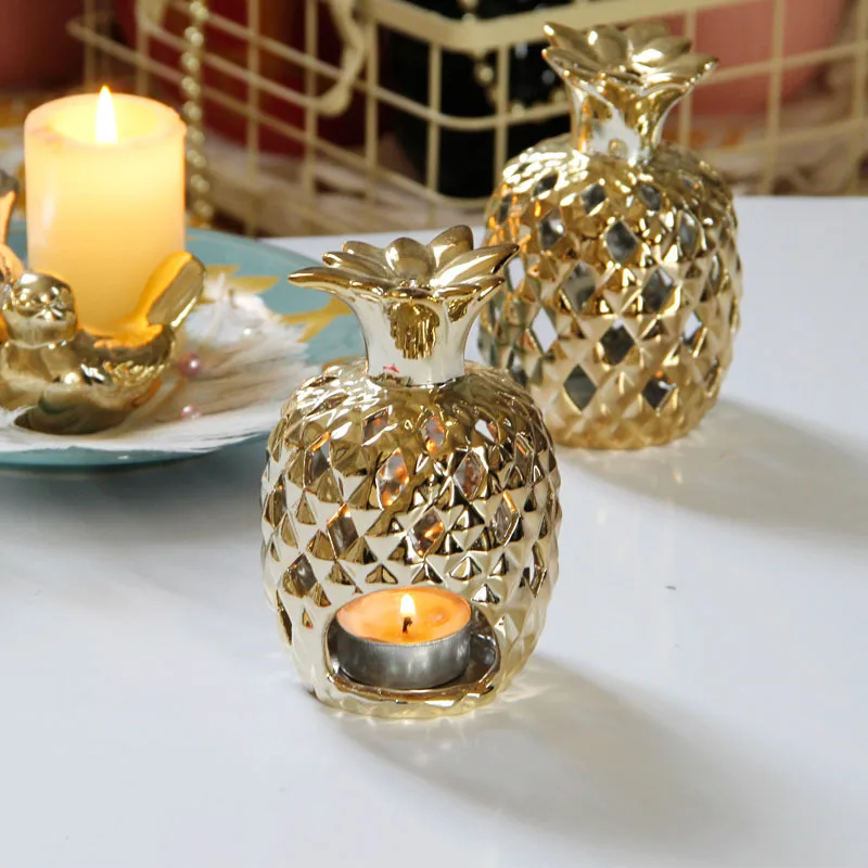 Kūrybos tuščiaviduriai aukso keramikos ananasų vėjo lempa, žvakė turėtojas Europos prabangių namų puošybai apdaila