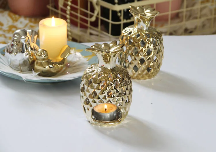 Kūrybos tuščiaviduriai aukso keramikos ananasų vėjo lempa, žvakė turėtojas Europos prabangių namų puošybai apdaila